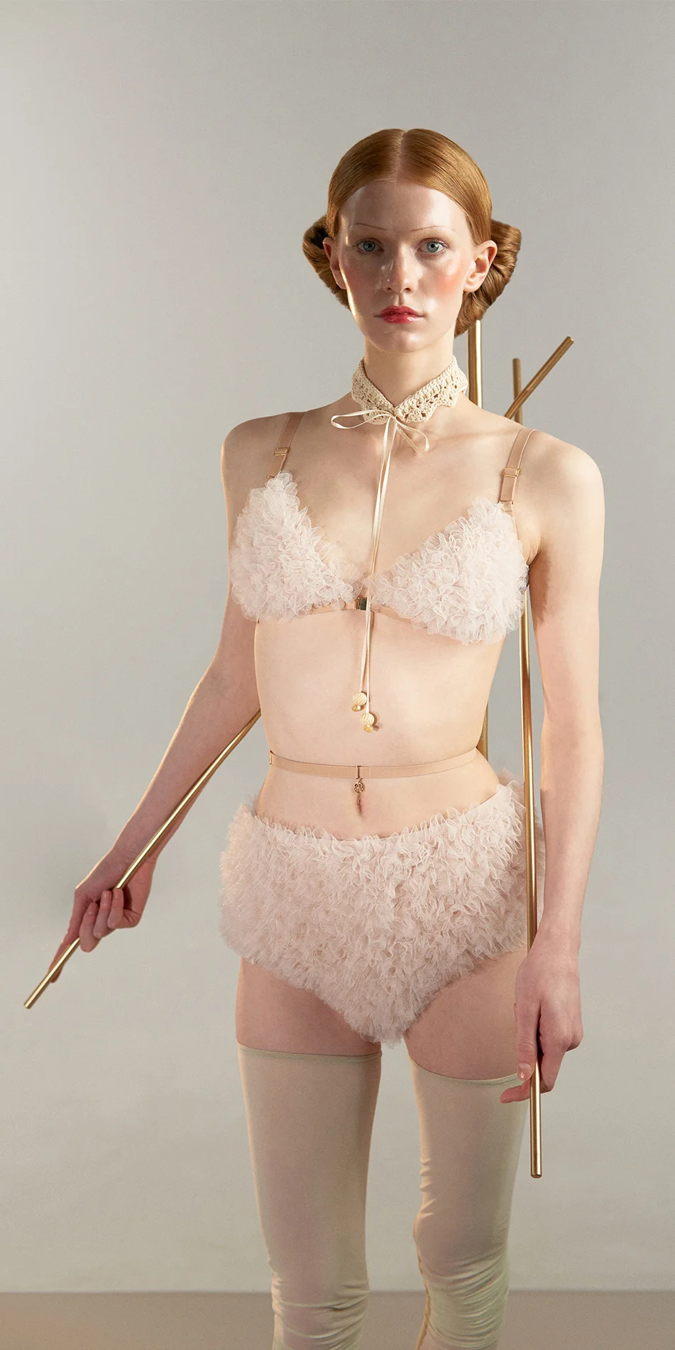 Bralette with ruffles in pearl pink cropped front view on