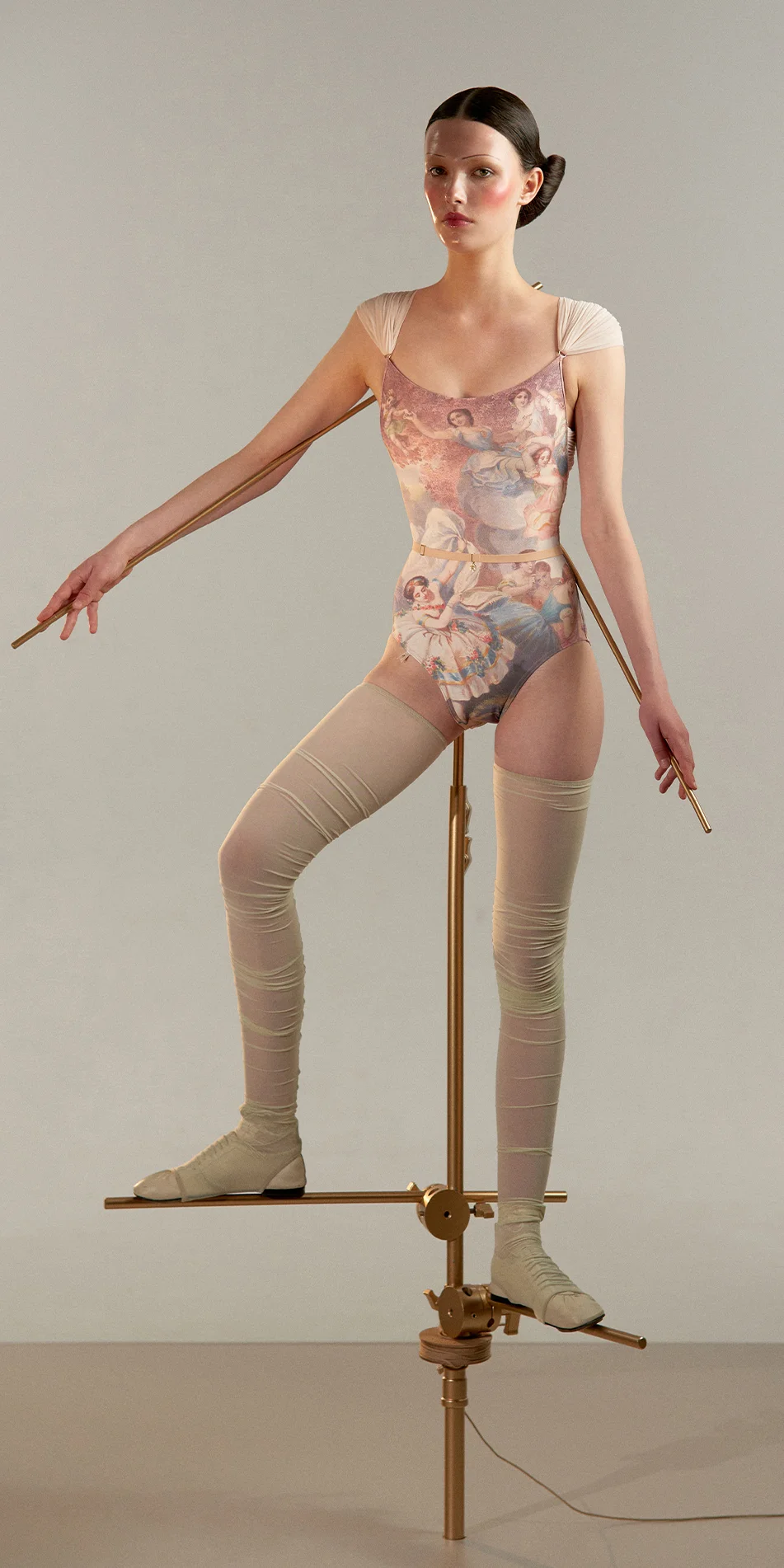 Cross back sleeveless leotard in pearl pink front view on