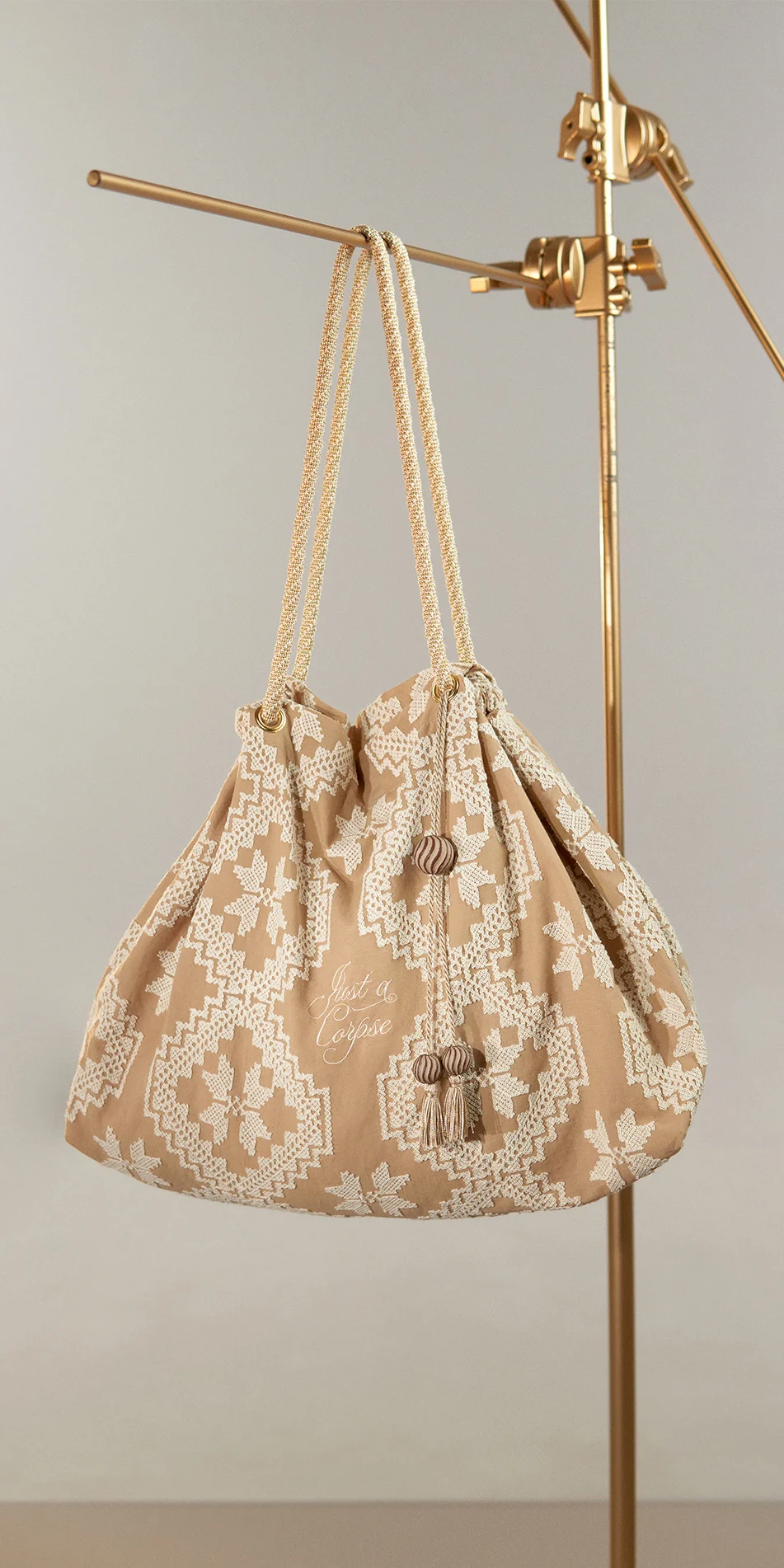 Embroidered tote in biscuit beige front view on