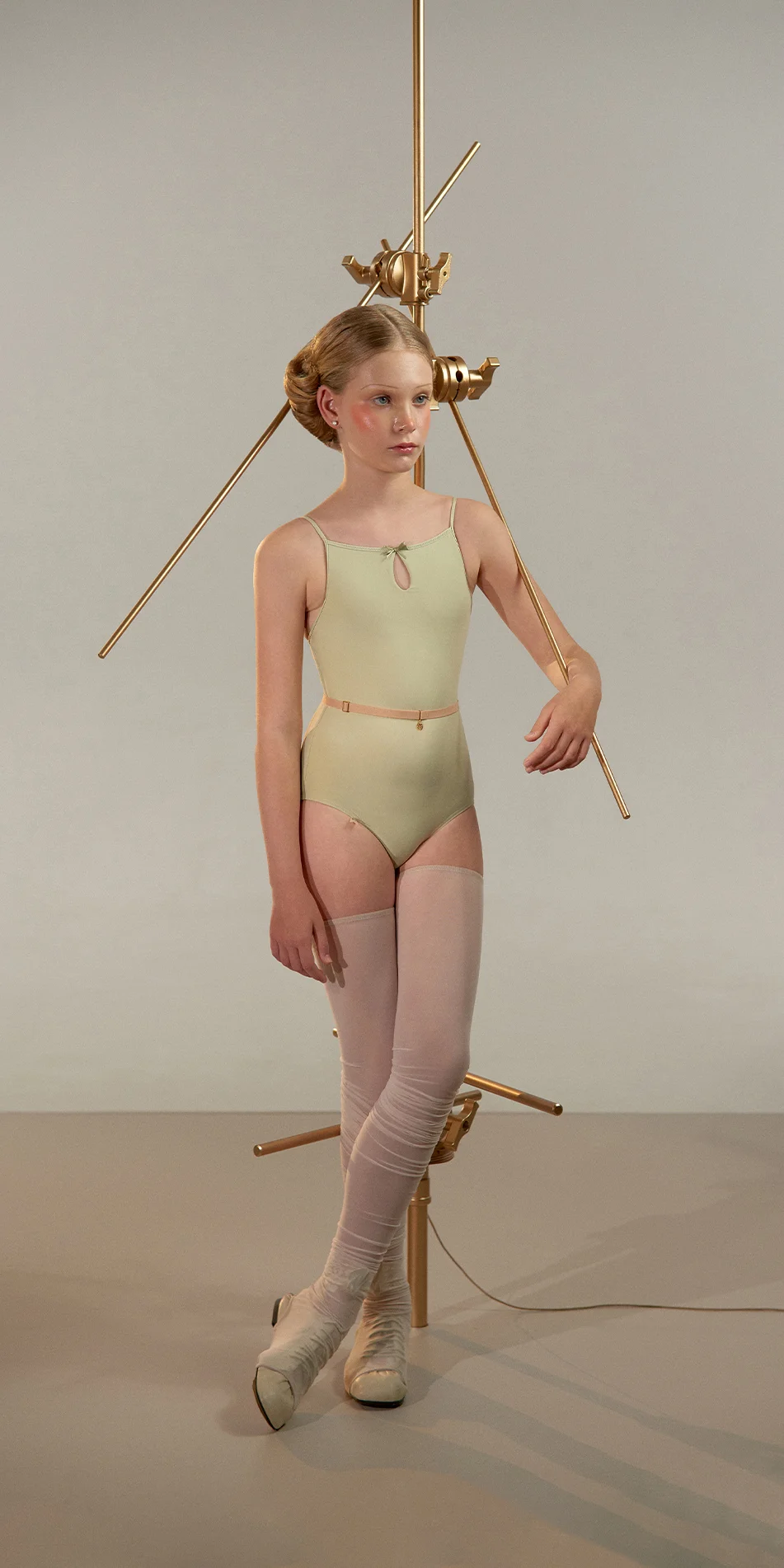 Junior camisole leotard in green tea shade front view on