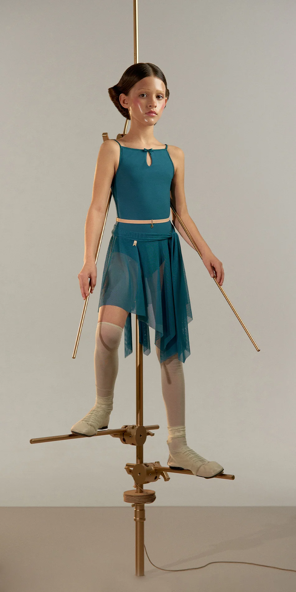 Junior draped wrap skirt in petrol blue front view on
