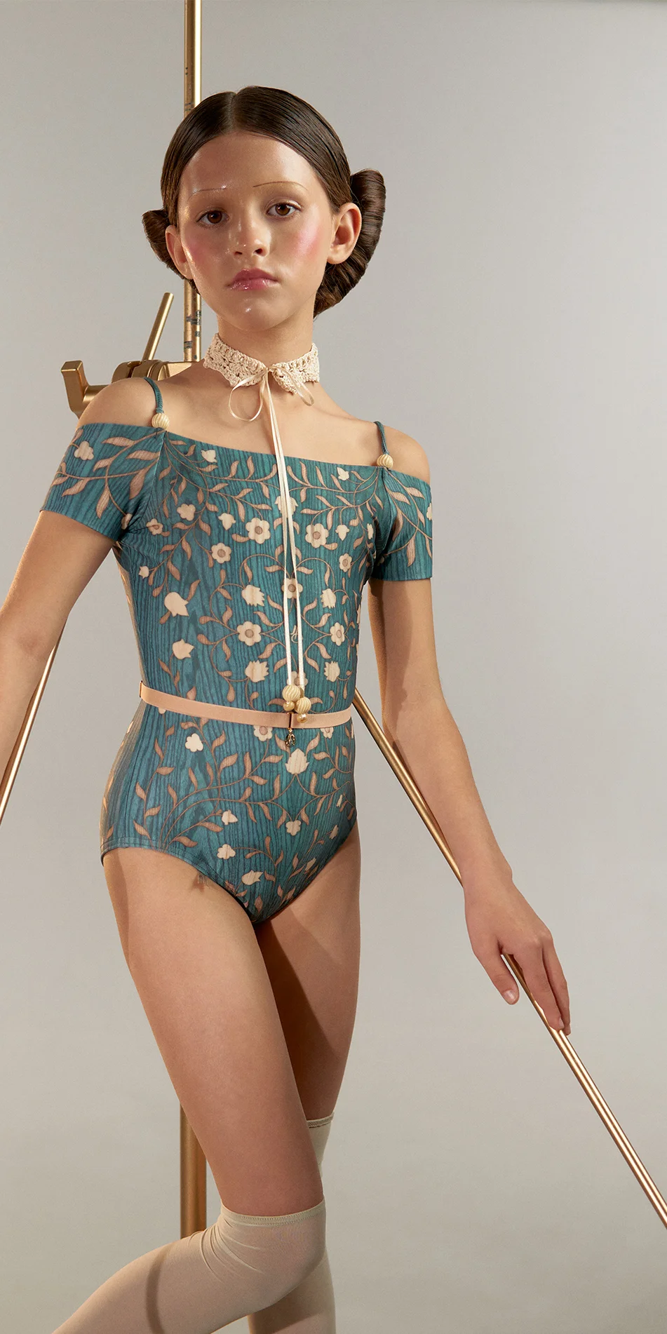 Junior off shoulder leotard in short sleeve petrol cropped front view on