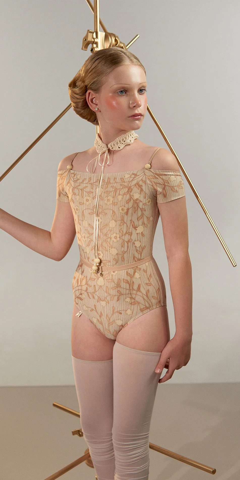 Junior off shoulder leotard in short sleeve pine cropped fornt view side look on