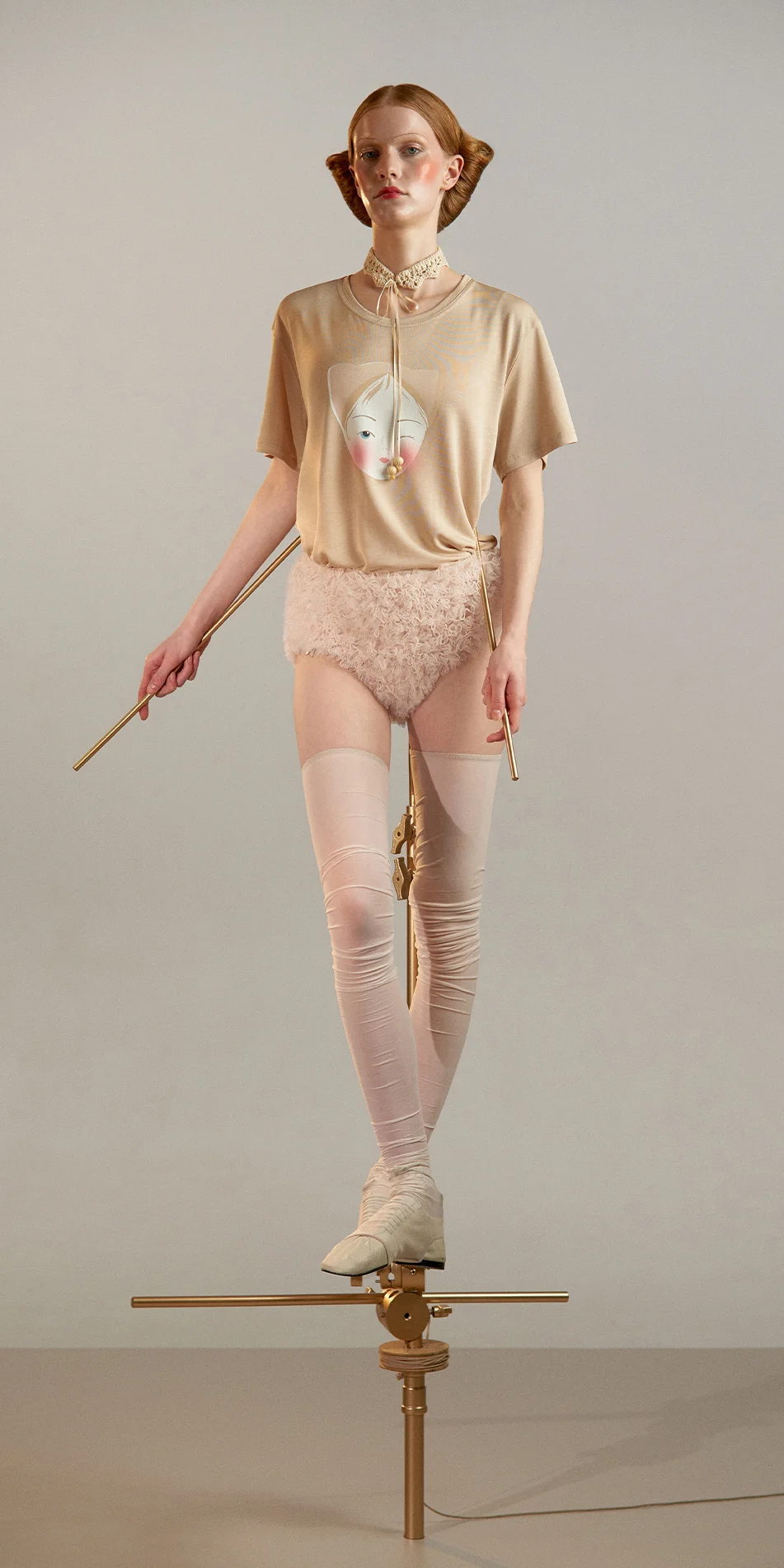 Tencel t shirt with doll print in biscuit beige front view on