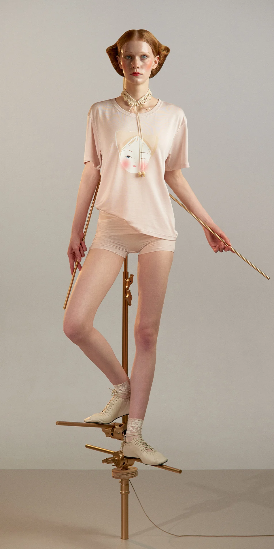 Tencel t shirt with doll print in pearl pink front view on