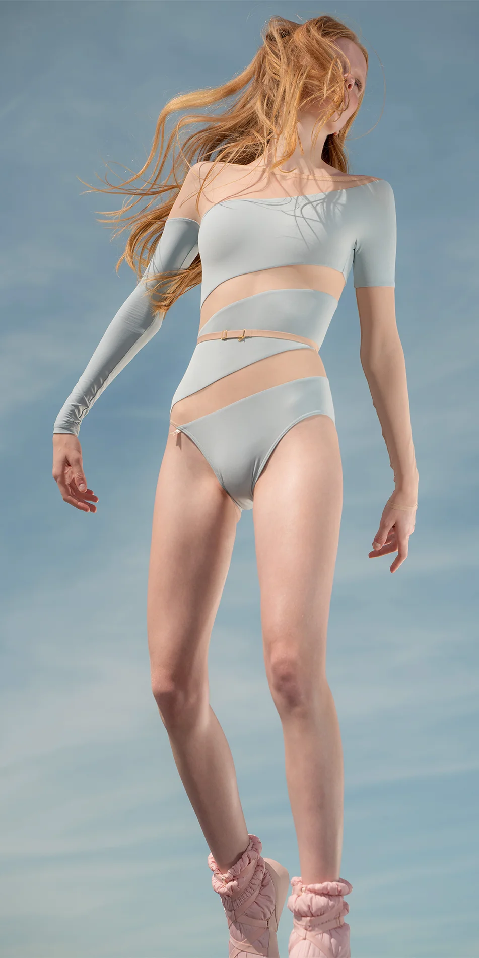 Spiral boatneck leotard with stretch mesh in sky blue front view jump