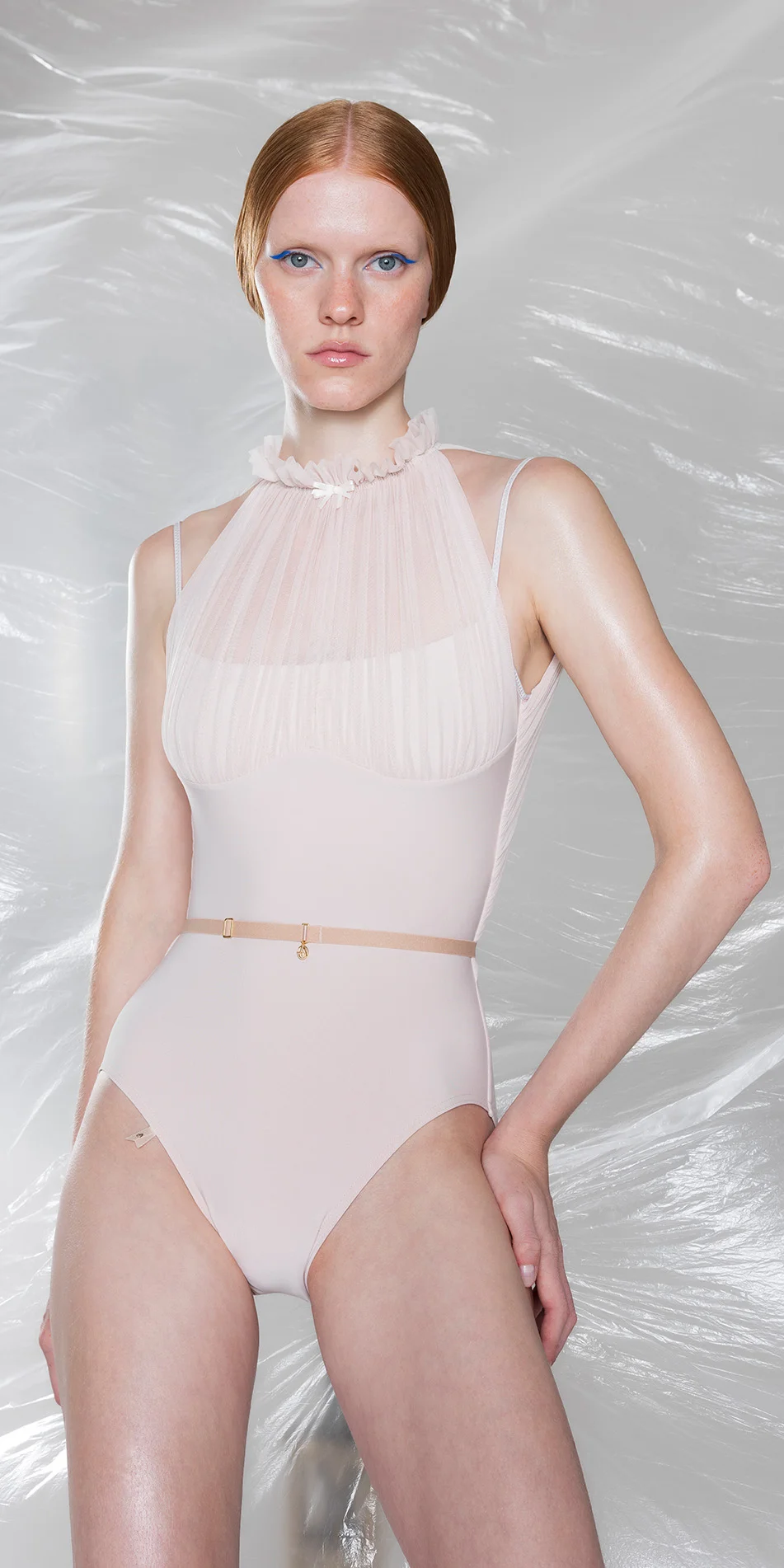 Draped mockneck leotard in pearl pink front view cropped