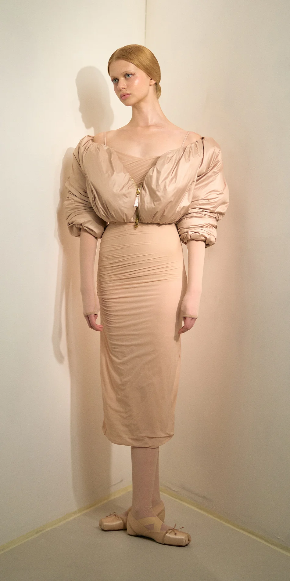 Cropped boatneck puffer jacket in light beige front view on