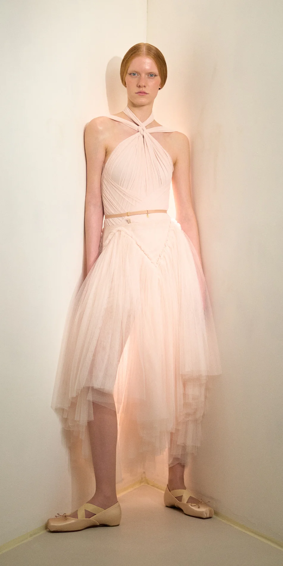 Draped tulle midi skirt in soft pink front leaning on
