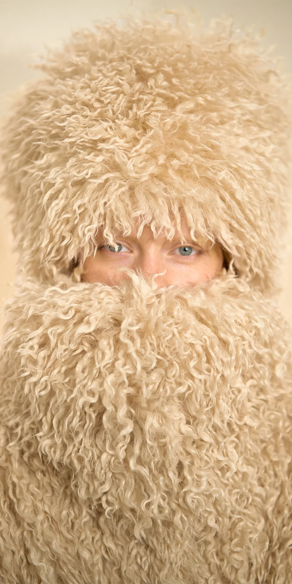 Faux fur hat neck warmer light beige close up portrait