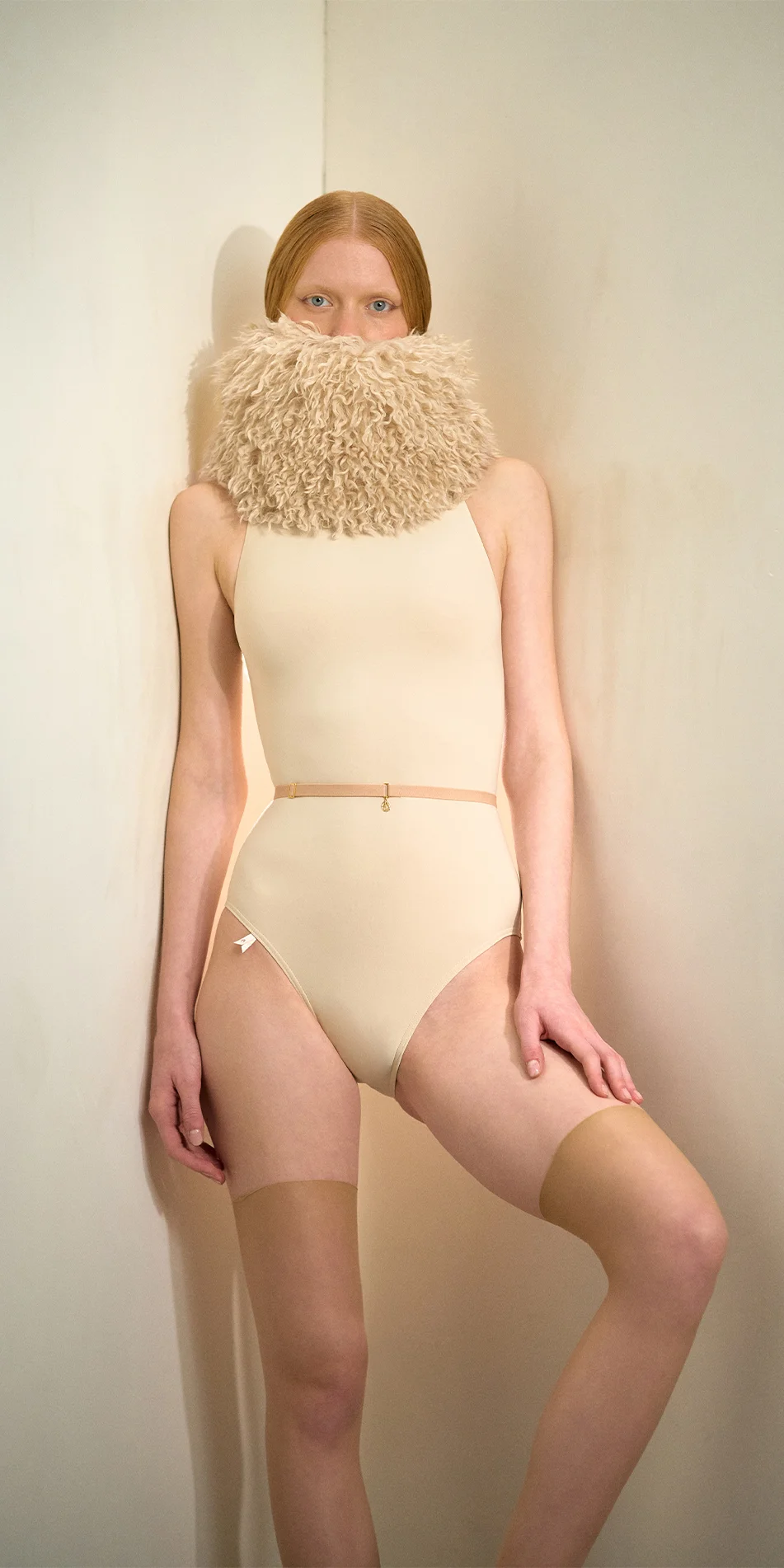 Faux fur hat neck warmer light beige front arm on leg on 1