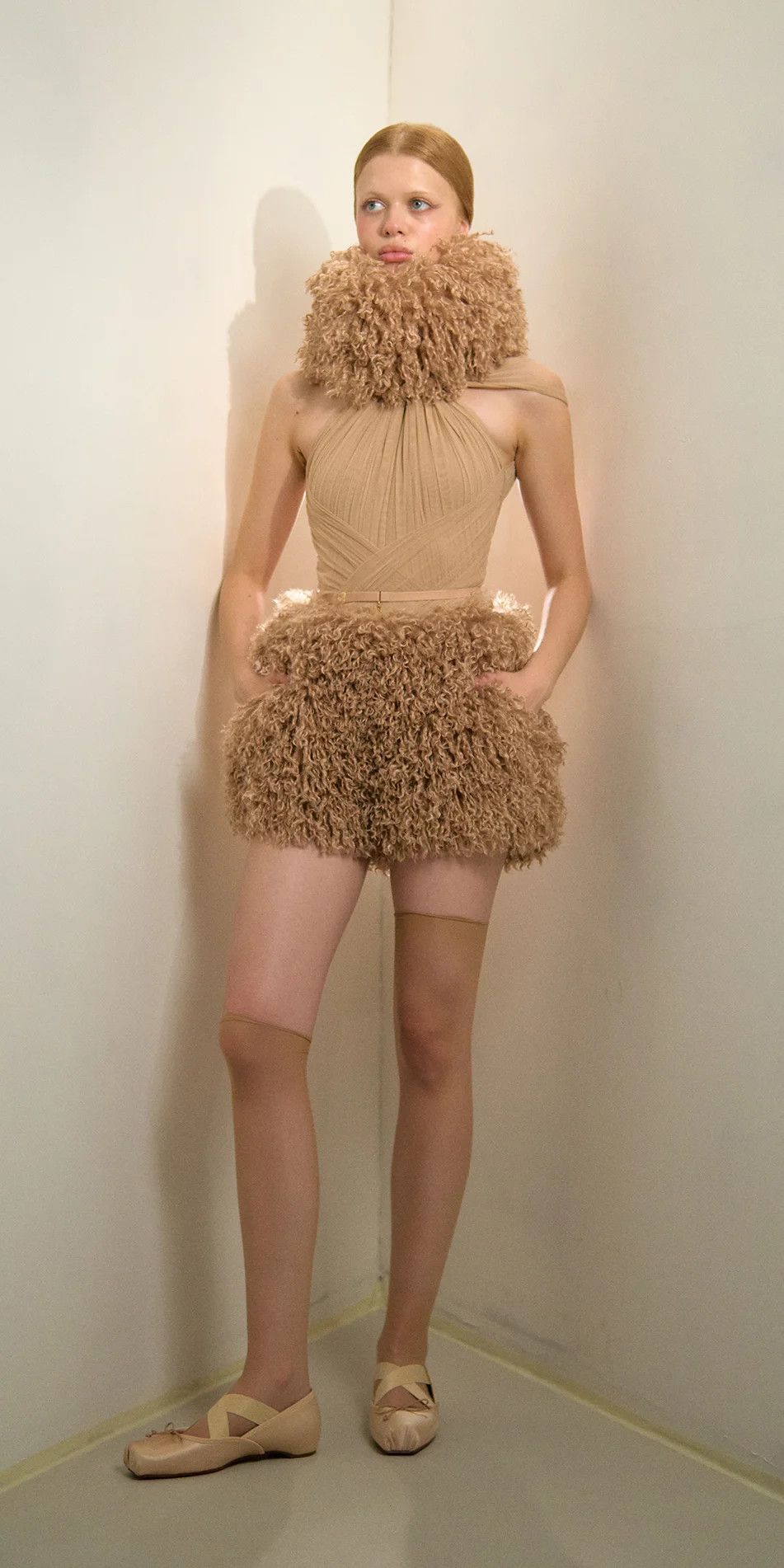 Faux fur hat neck warmer nude front hands in pockets