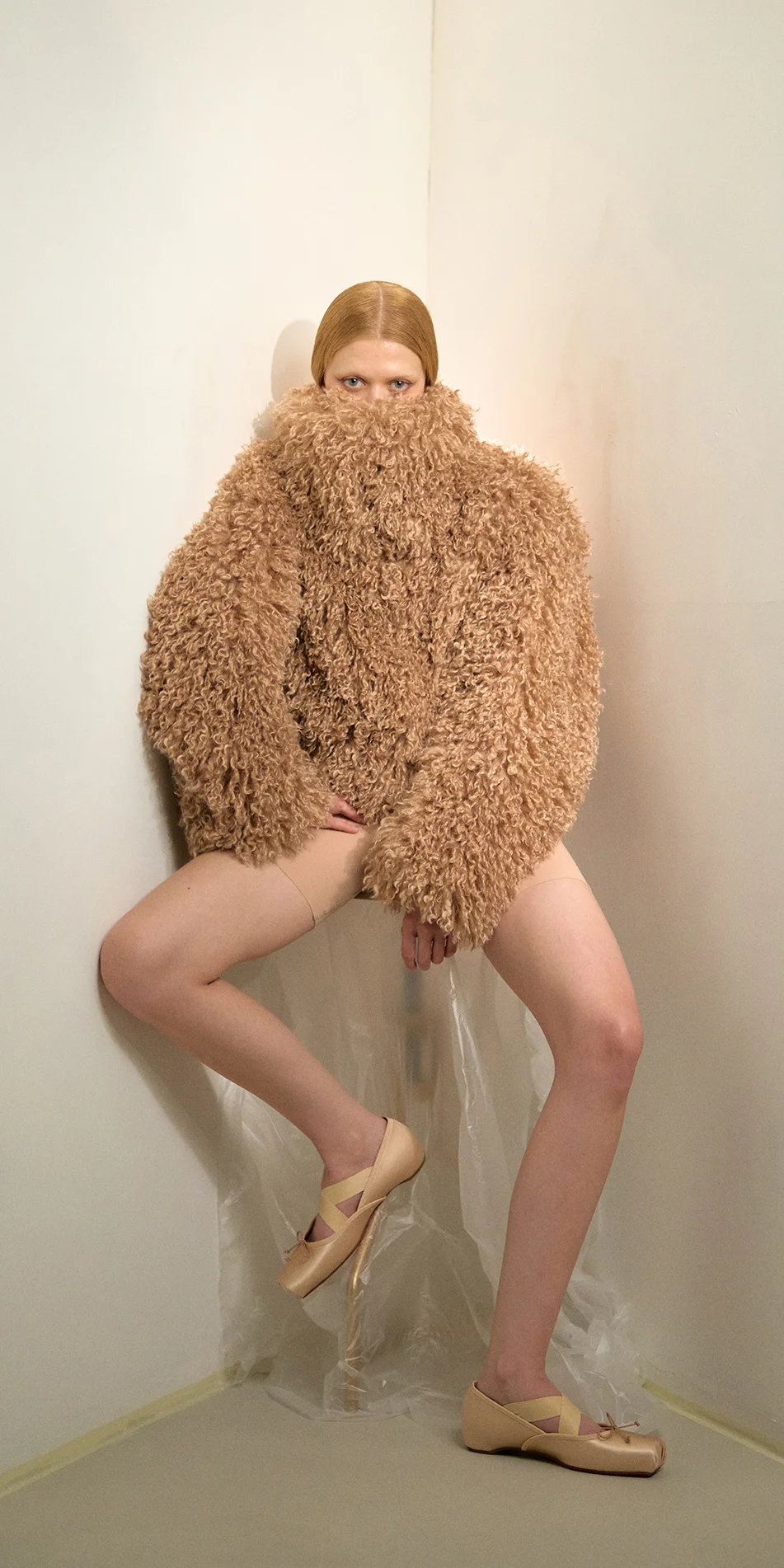Faux fur jacket nude front sitting on
