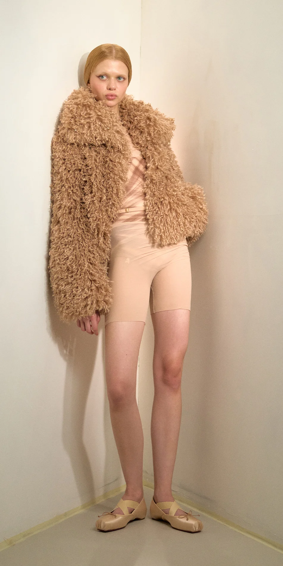 Faux fur jacket nude front view leaning back