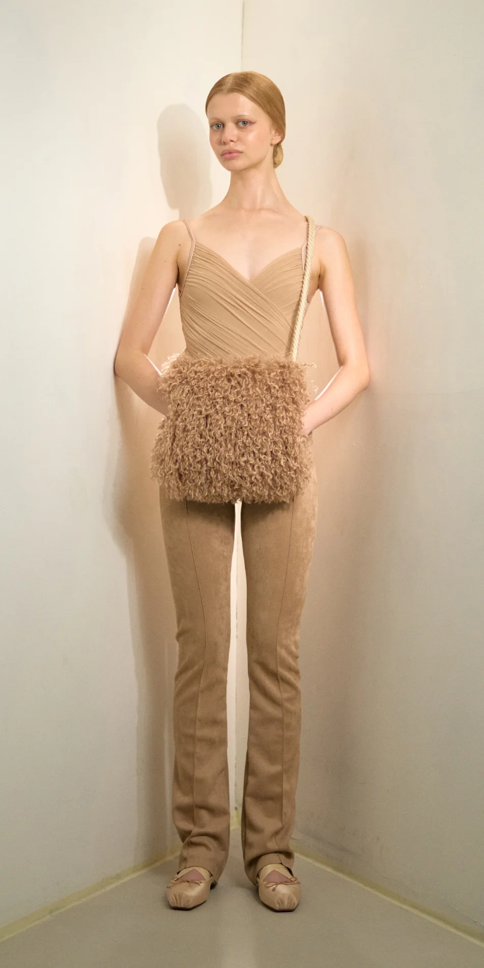 Faux fur muff crossbody bag nude front standing
