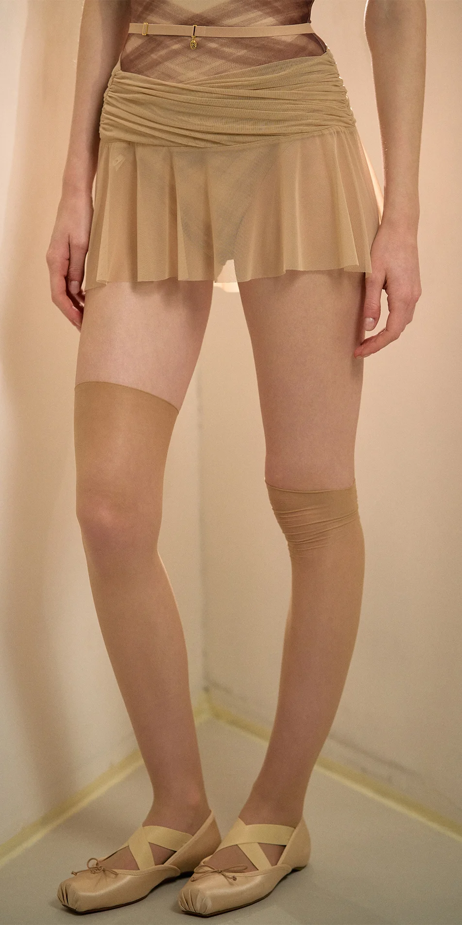 Mesh mini skirt in light beige front cropped