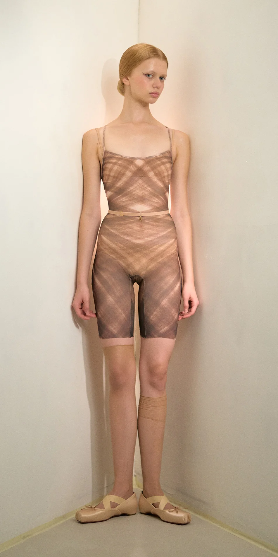 Soft mesh bike shorts bodysuit in mocha brown front view on