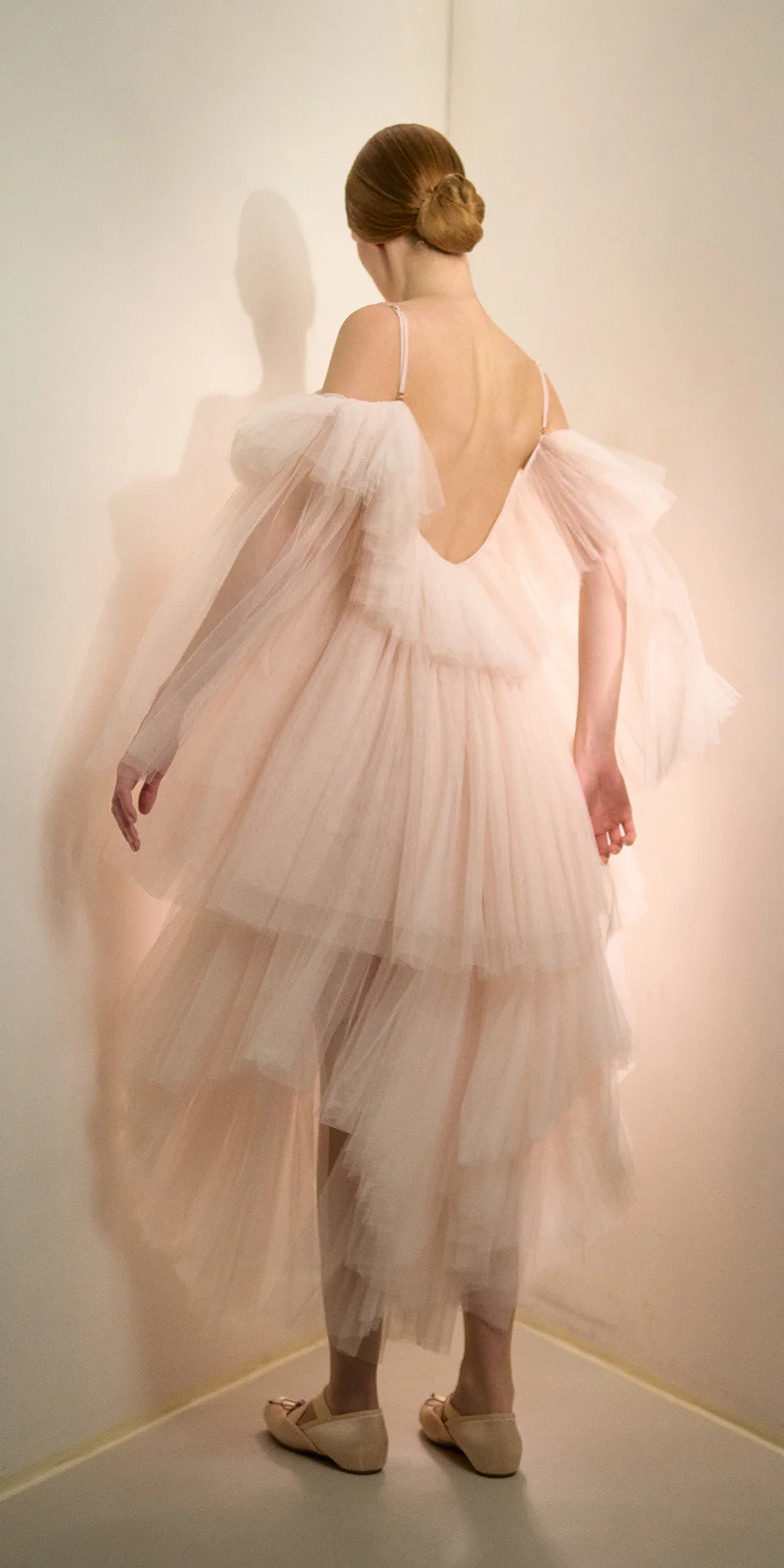 Tulle babydoll dress angel sleeves in soft pink back turning