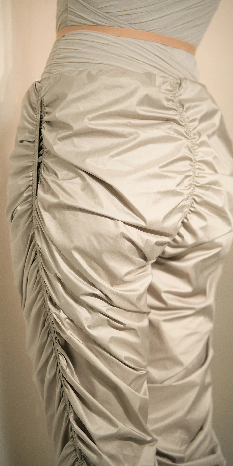 Women's draped track pants in sage green back close up