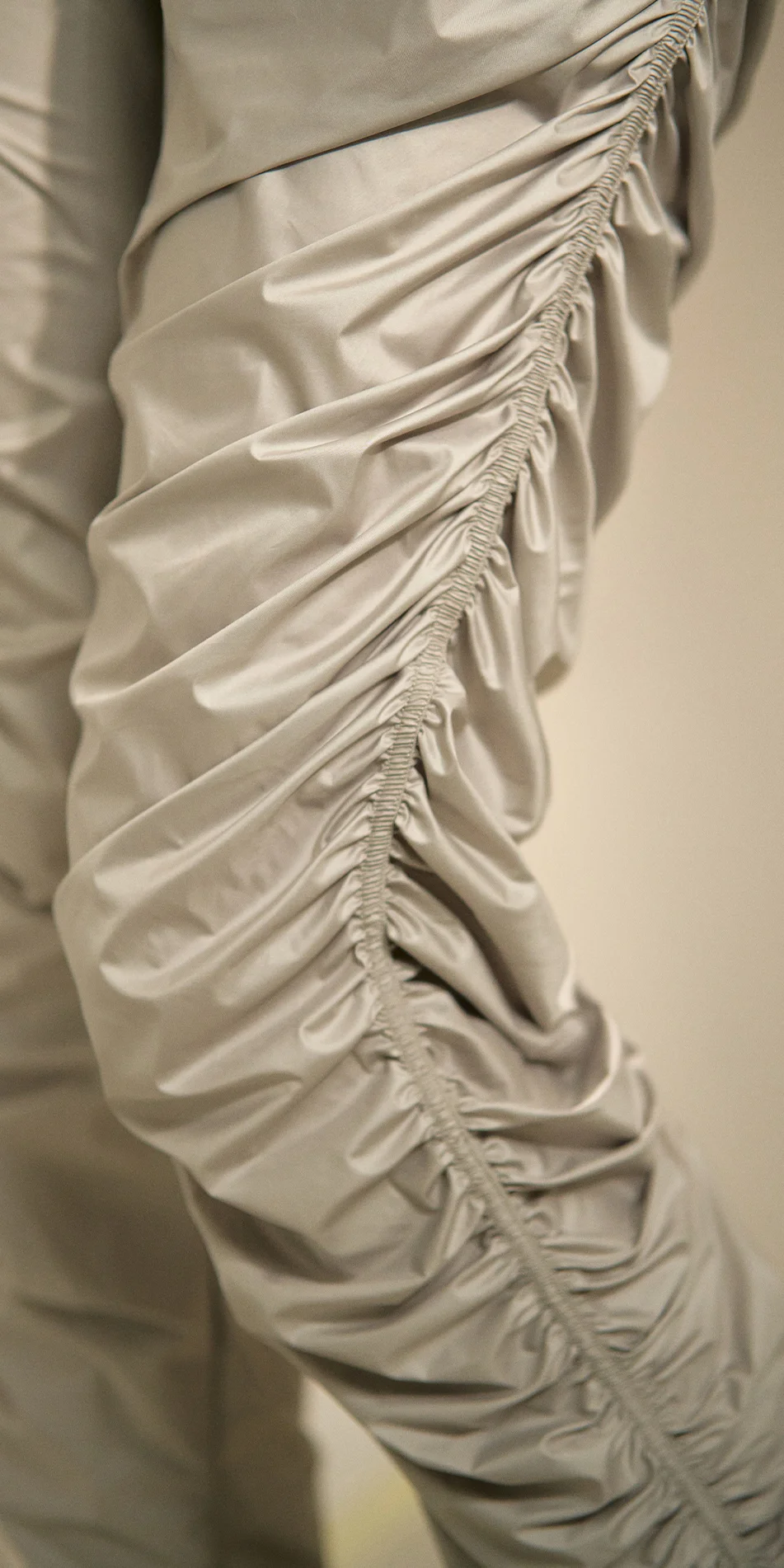 Women's draped track pants in sage green detail