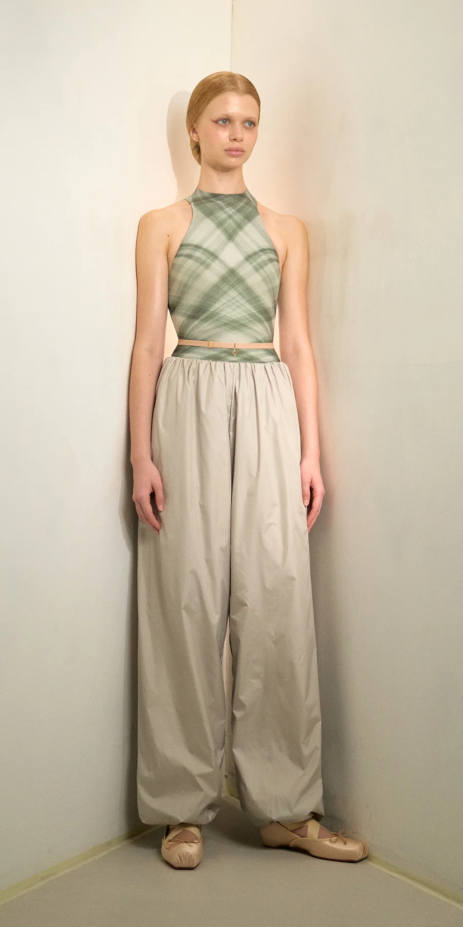 Women's lightweight baggy pants in sage green front view on