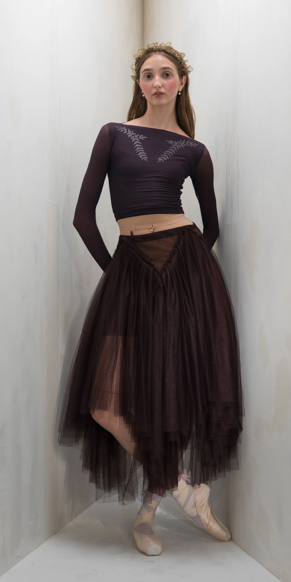 Draped tulle midi skirt in dark purple front leg crossed dark