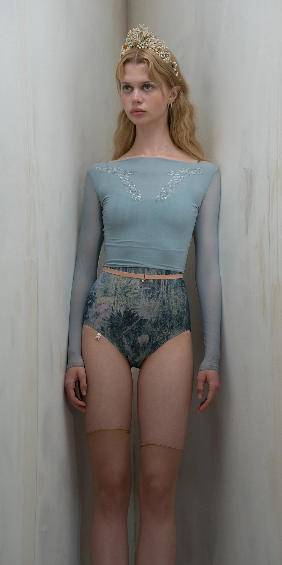 Sheer crop top with rhinestuds in light blue front on