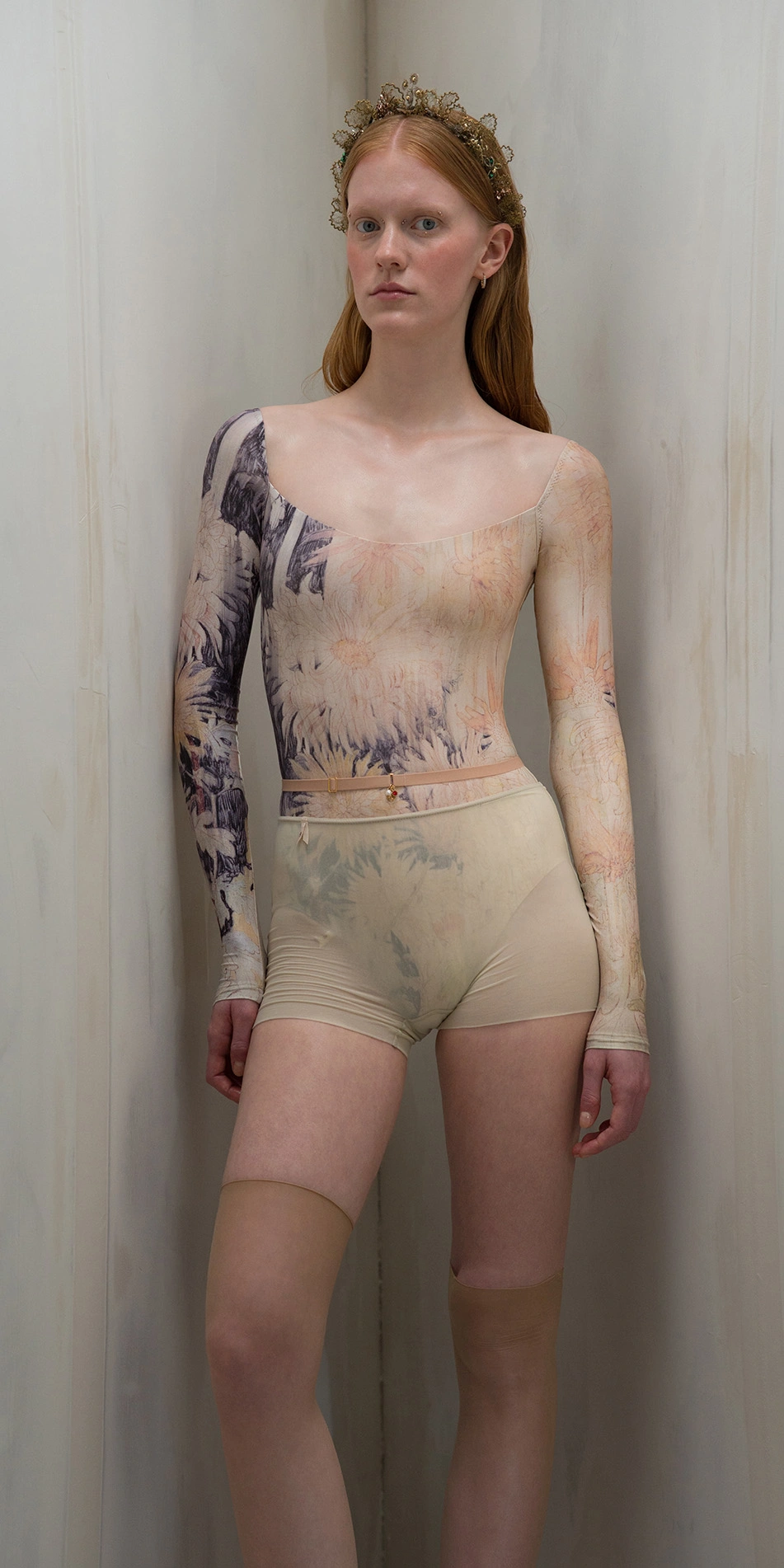 Sheer shorts with rhinestuds in beige front on