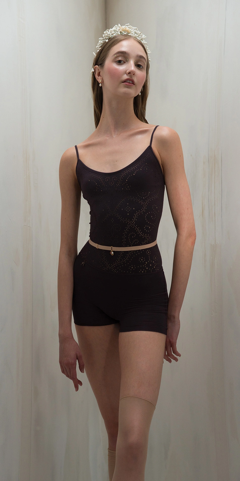 Sheer shorts with rhinestuds in dark purple front on
