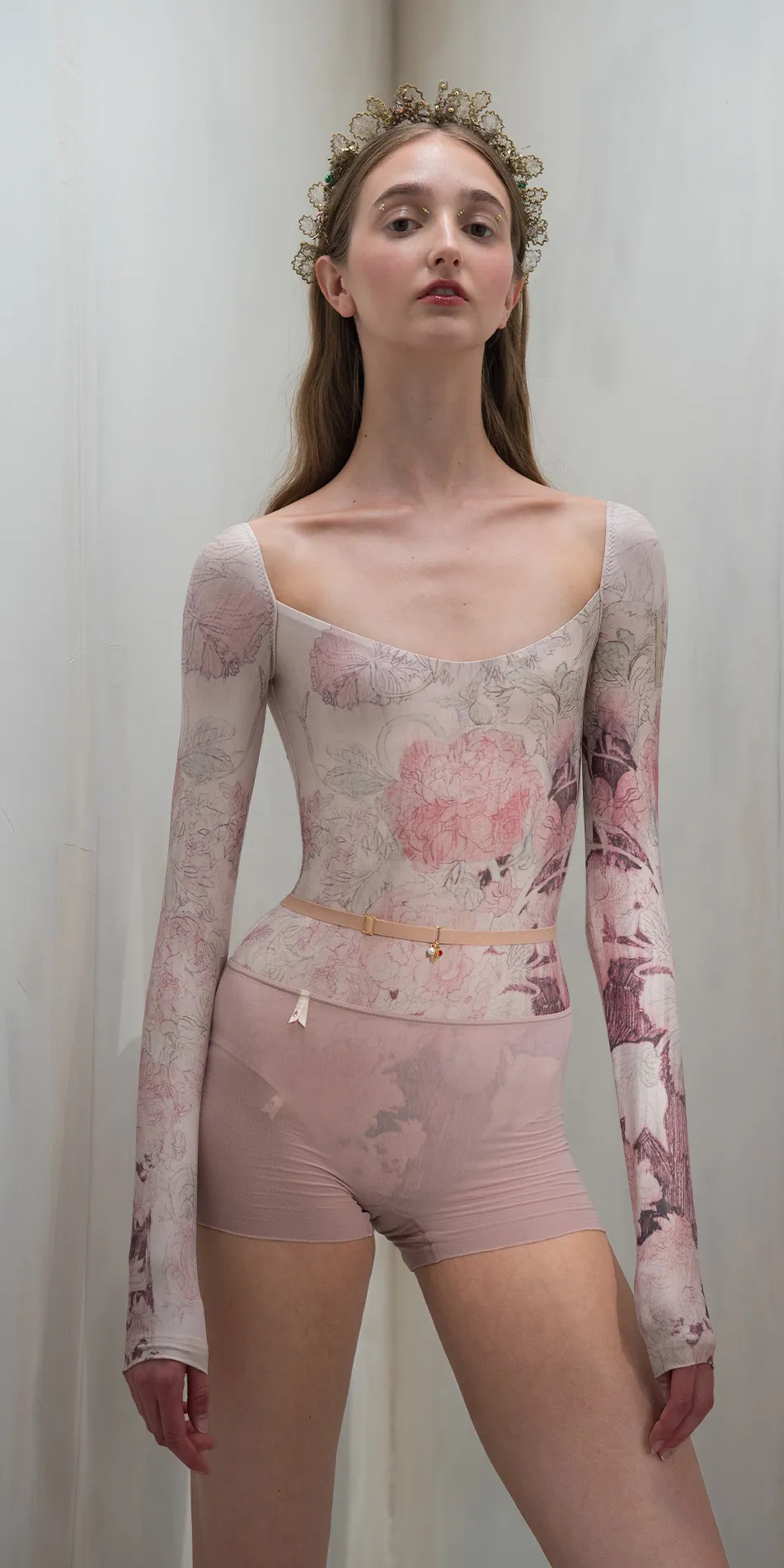 Sheer shorts with rhinestuds in dusty pink front cropped