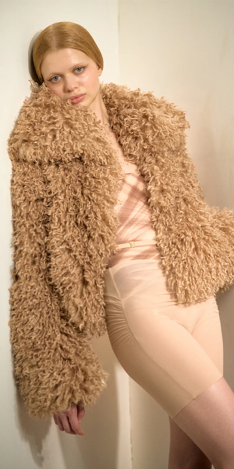 Faux fur jacket nude leaning close up 1