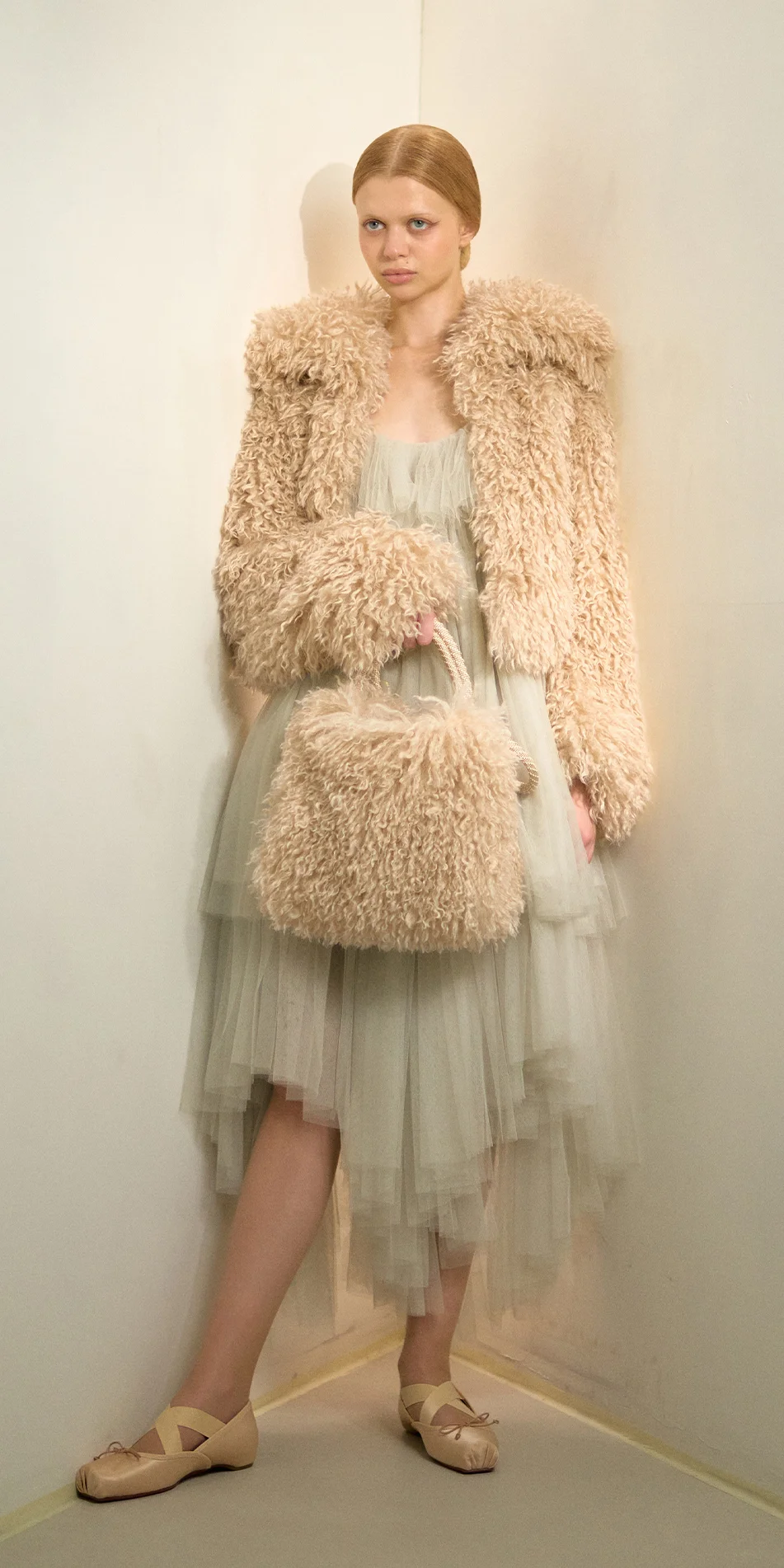 Faux fur muff crossbody bag light beige front view