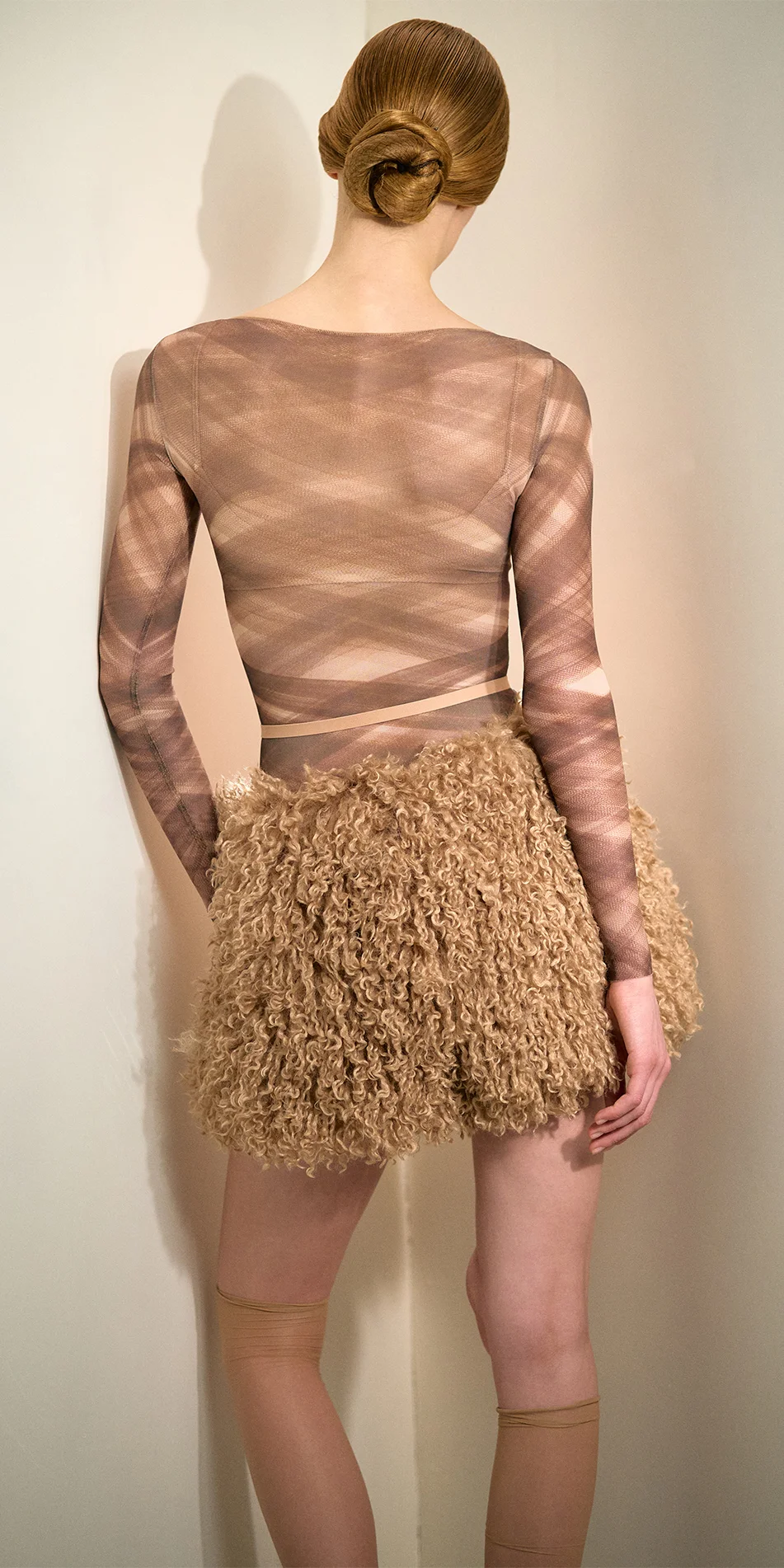 Faux fur shorts nude back view leaning