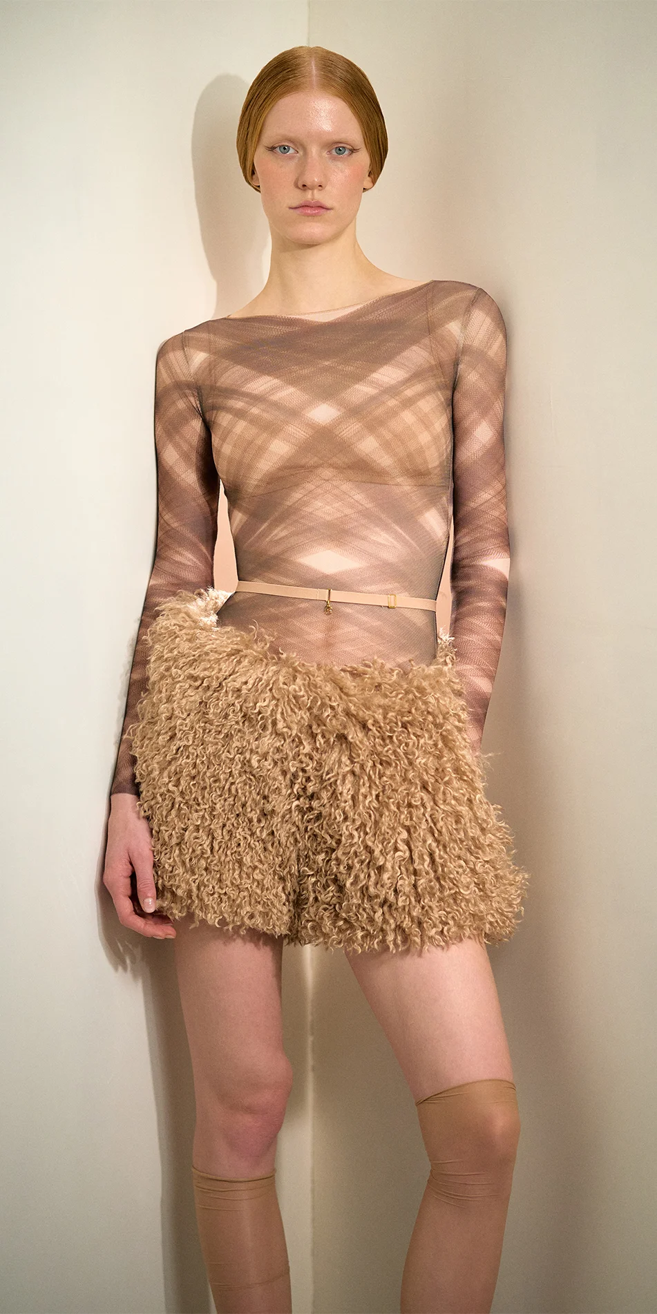 Faux fur shorts nude front one hand in pocket