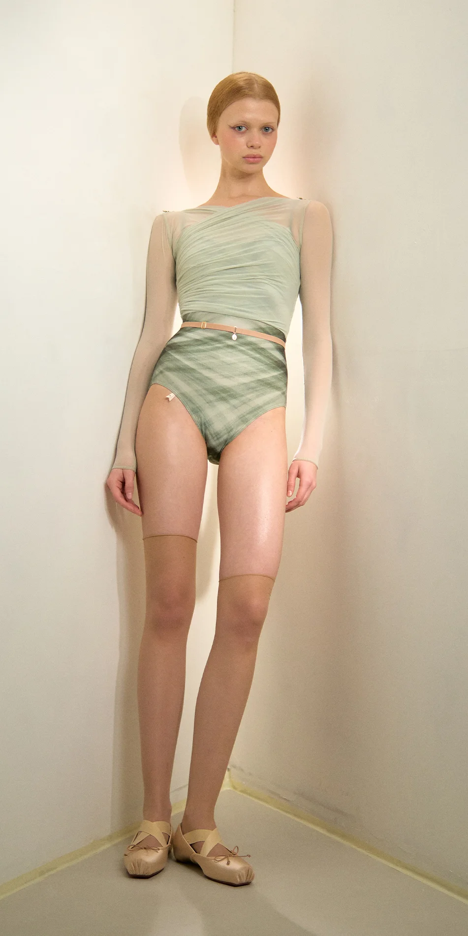 Sheer wrap croptop with long sleeves in sage green front view on