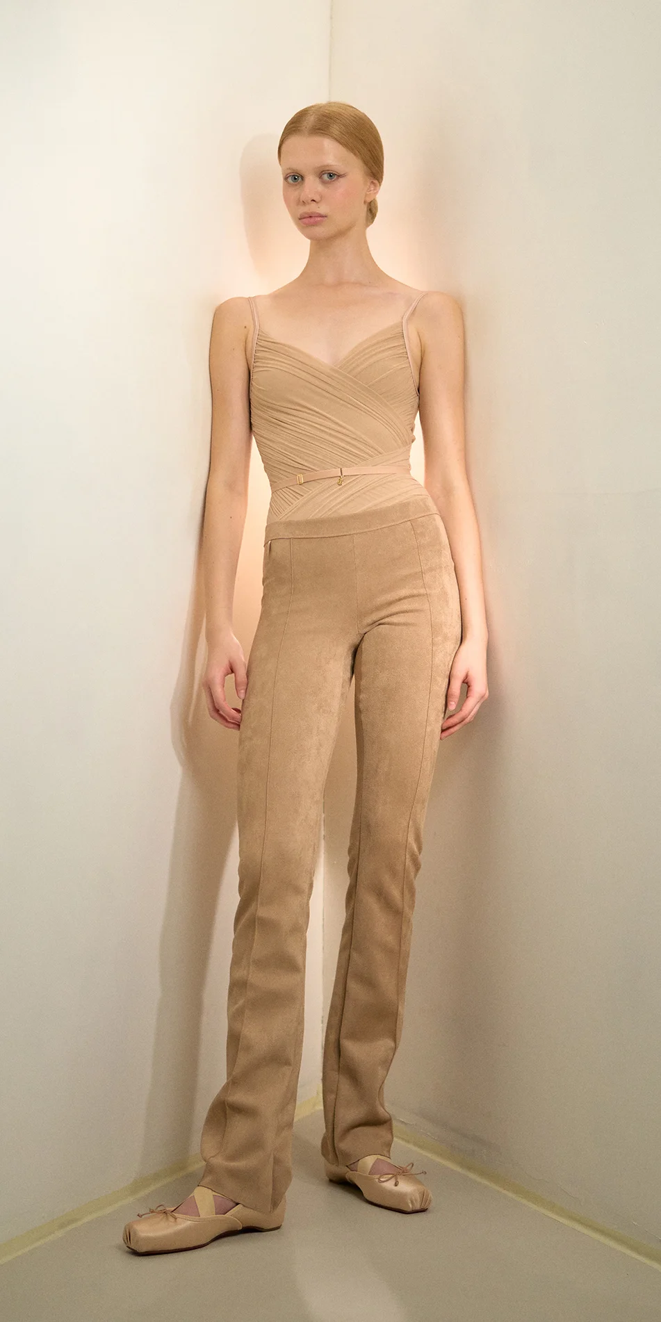 Suede pull on pants in nude front view posing on