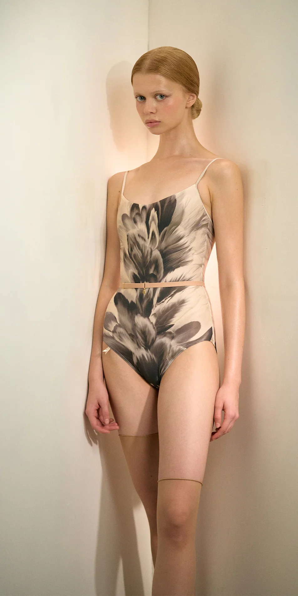 Swan print camisole leotard in black & white model side view light on