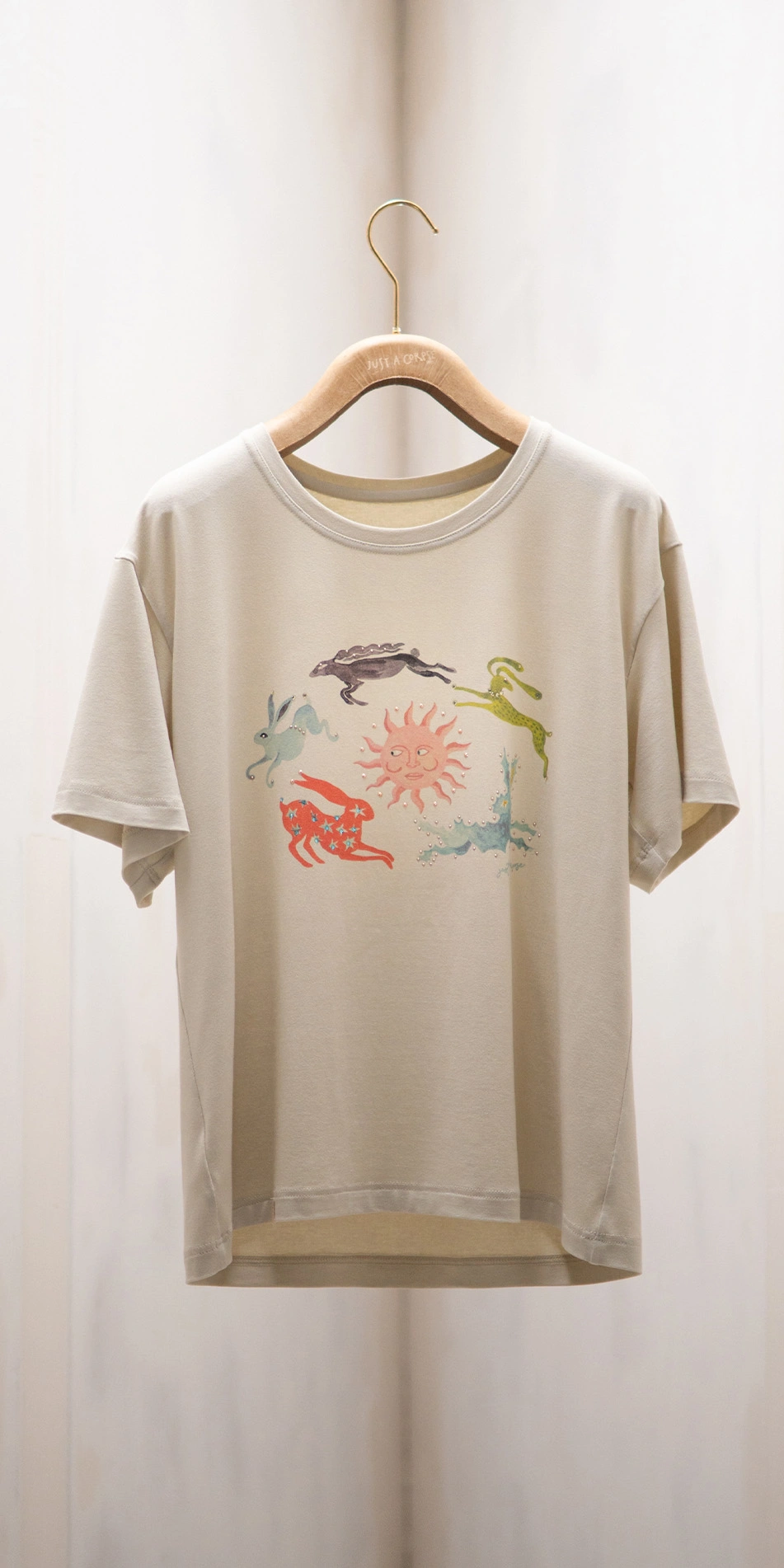 rabbit print t shirt with rhinstones in beige front rabbit print t shirt with rhinstones in beige front